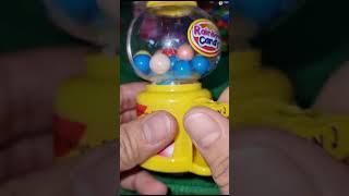 TINY YELLOW GUMBALL MACHINE