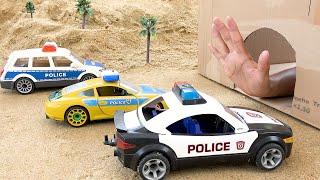 toy police car in cave gets help from fire truck | dump truck trouble in sand