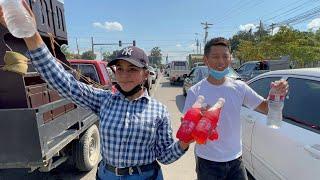 Selling drinks on the Honduran highway 