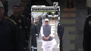 MIG-29S stands tall in background as Defence Minister Rajnath Singh onboard INS Vikrant