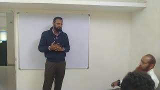 Mushtaq Ahmed presenting his topic at QAANS