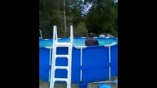 Brian Leverett jumping into the pool in Kingsland