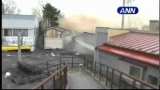 Ground Level Footage  of the japanese Tsunami