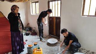 Plastering the dream house: finishing the whitewash of our cottage