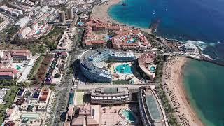 Playa de Las Americas is a resort in the south of Tenerife, Spain. Drone view and walk in November.