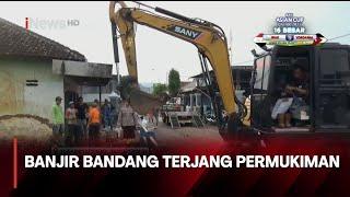 Banjir Merobohkan Tembok Rumah Warga di Tulungagung