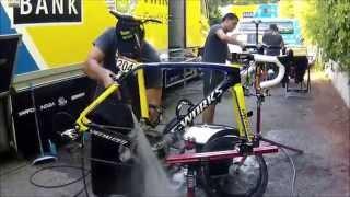 Tinkoff-Saxo - Mechanics preparing the team bikes