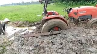 How to remove a tractor from mud , Tractor stuck in mud