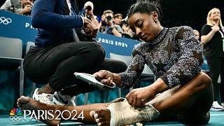 Simone Biles fights through calf pain to push U.S. into lead at Paris qualifications | NBC Sports