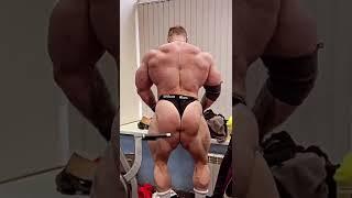 Muscle giant Sergey Danilov showing off amazing back side