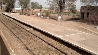 17 Up Millat Express waiting for departure at Charnali Railway Station