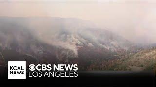 Aircraft lined up to drop retardant and water on the growing Palisades Fire