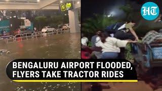 Bengaluru airport: How passengers took tractor rides to catch flights amid severe waterlogging