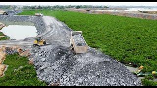 To construct a road foundation  using powerful SHANTUI dozers, SDLG wheel loaders & dump trucks