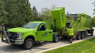 Mini Garbage Trucks Dumping into a Massive Freightliner Leach Rear Loader