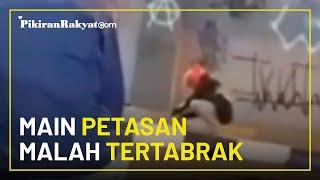 Video Viral di Media Sosial, Iseng Bermain Petasan, Seorang Pria Tertabrak Motor yang Melaju Kencang