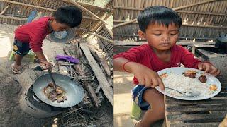 Little boy fried pork , Rural life village