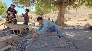 Title: The progress of Maryam's family in cementing the house with the help of a neighbor