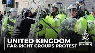 Far-right protesters clash with police in UK cities as unrest spreads