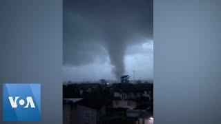 Apparent Tornado Tears Through Milan Suburb  | VOA News