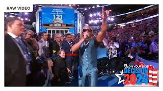 Rapper Lil Jon helps Georgia delegates cast their votes during day two of the DNC