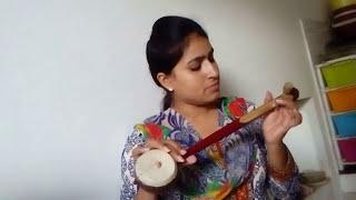 Amrit kaur playing TUMBI one string instrument