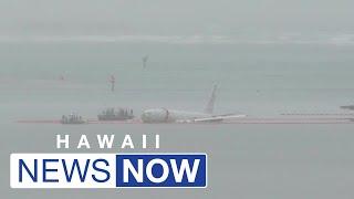 Large military aircraft overshoots runway, ends up in Kaneohe Bay