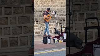 A singing man on Deoksugung Doldamgil (Stone-wall Road)