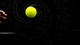 Wet spinning tennis ball in Slow Motion