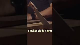 Who will be eliminated in the slasher blade battle?