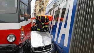 Impact of two trams into the car