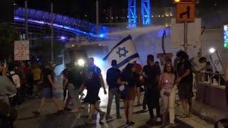 Water cannon used to disperse anti-government protesters in Tel Aviv