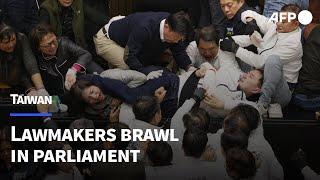 Taiwan lawmakers brawl over bills that could 'damage democracy' | AFP