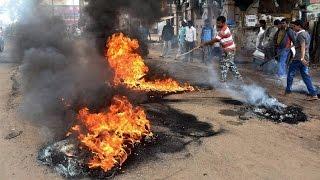 PoK elections : Pakistani flags burned by protesters over rigged polling | Oneindia News