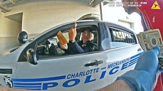 Charlotte Cop Caught on Camera Stealing Cash From a Detainee