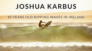 10 years old surfing winter waves in Ireland 2020