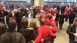 Georgia and Alabama fans file into Mercedes-Benz Stadium