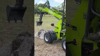 NESHER Electric farm equipment is quiet, powerful, and versatile! #loader #tractor #electrictractor