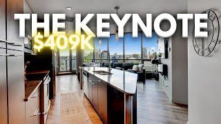 Tour inside this $409,900 modern Calgary condo with mountain + downtown views!