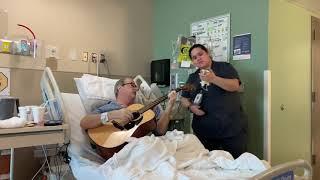 My dad and his nurse, Alex, singing O Holy Night at Sarah Cannon Cancer Center in Nashville, TN