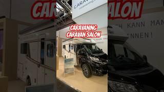 Caravaning.info at Caravan Salon 2023 in Düsseldorf. Standdesign with plant and XL LED video wall ️