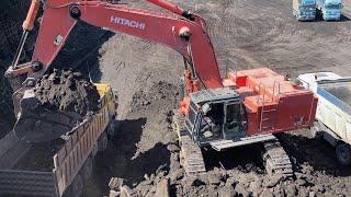 Hitachi Zaxis 670LCR Excavator Loading Mercedes And MAN Trucks - Operator Anogiatis