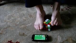 Solving Rubik's Cube with Feet for the First Time