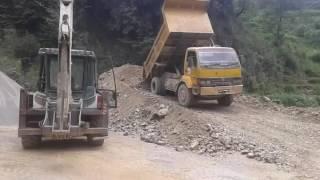 My tipper UNLOADING stones