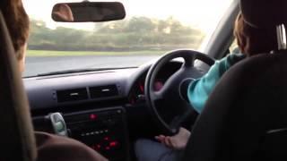 Scott McKenna, aged 11 drives his Dad's car on track