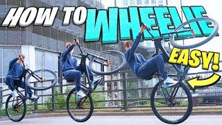 HOW TO WHEELIE ANY BIKE!! *PRO TIPS*