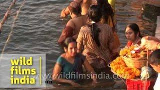 Women bathing in Ganges river during Shivratri, Varanasi