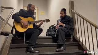 A private moment with Nachman Dreyer on guitar and Avrumi Balti on clarinet