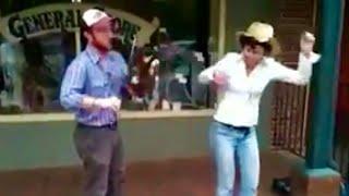 Miss Moonshine buckdancing so fast she knocks fiddle out of Chris Ryan's hands (OOPS!)