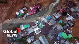 Indonesia landslide: Dozens buried after disaster at illegal gold mine on Sulawesi island